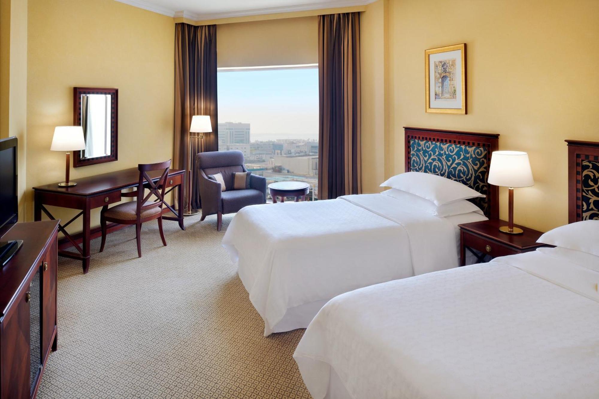 达曼喜来登会议中心酒店 外观 照片 A guest room at the Sheraton Riyadh Hotel